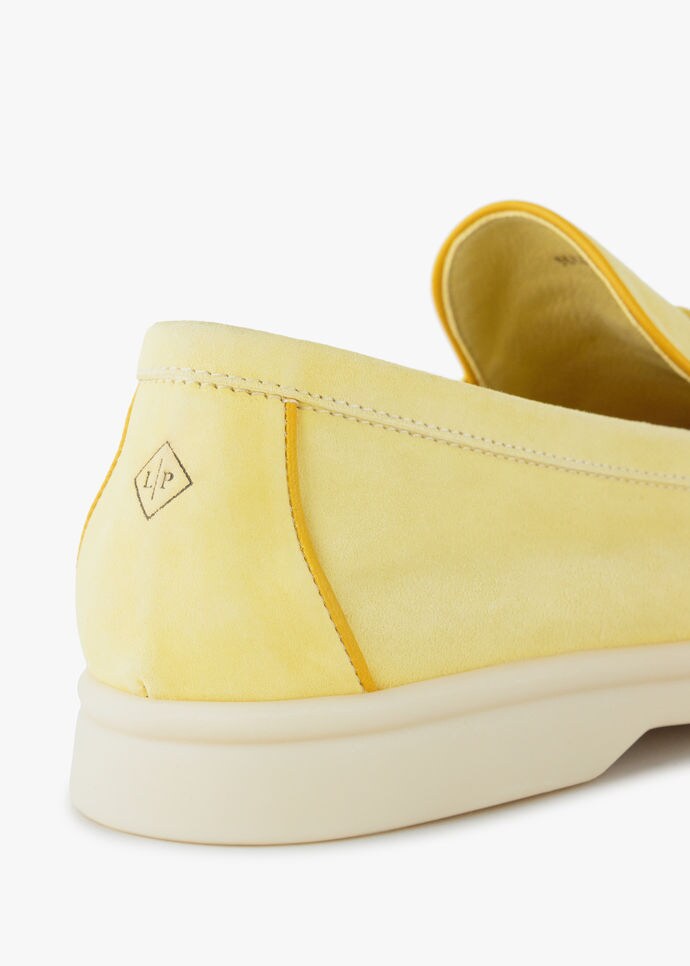 moccasin crafted from unlined suede treated with a light water
