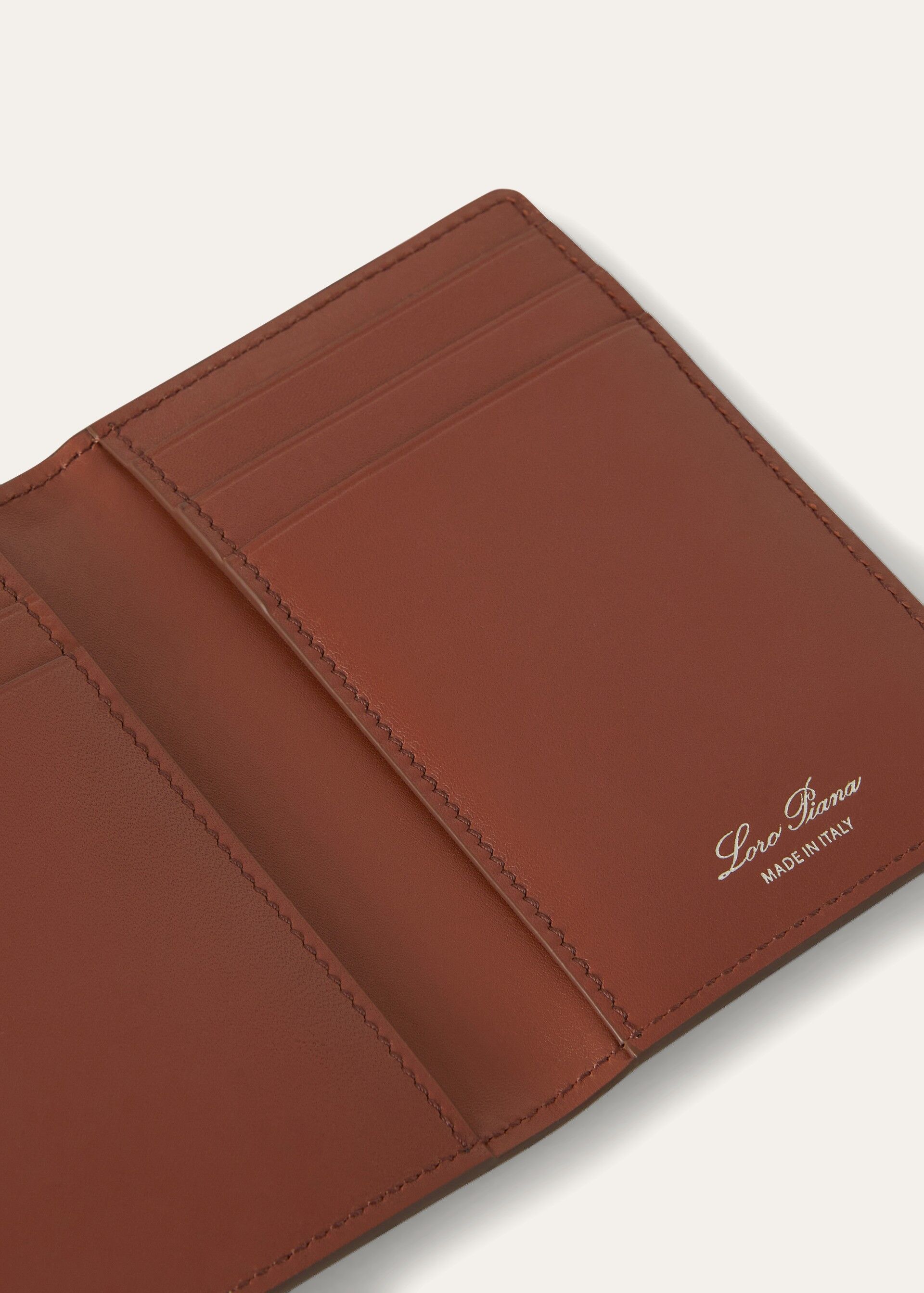 BIFOLD VERTICAL CC HOLDER OSTRICH SADDLE FINISH