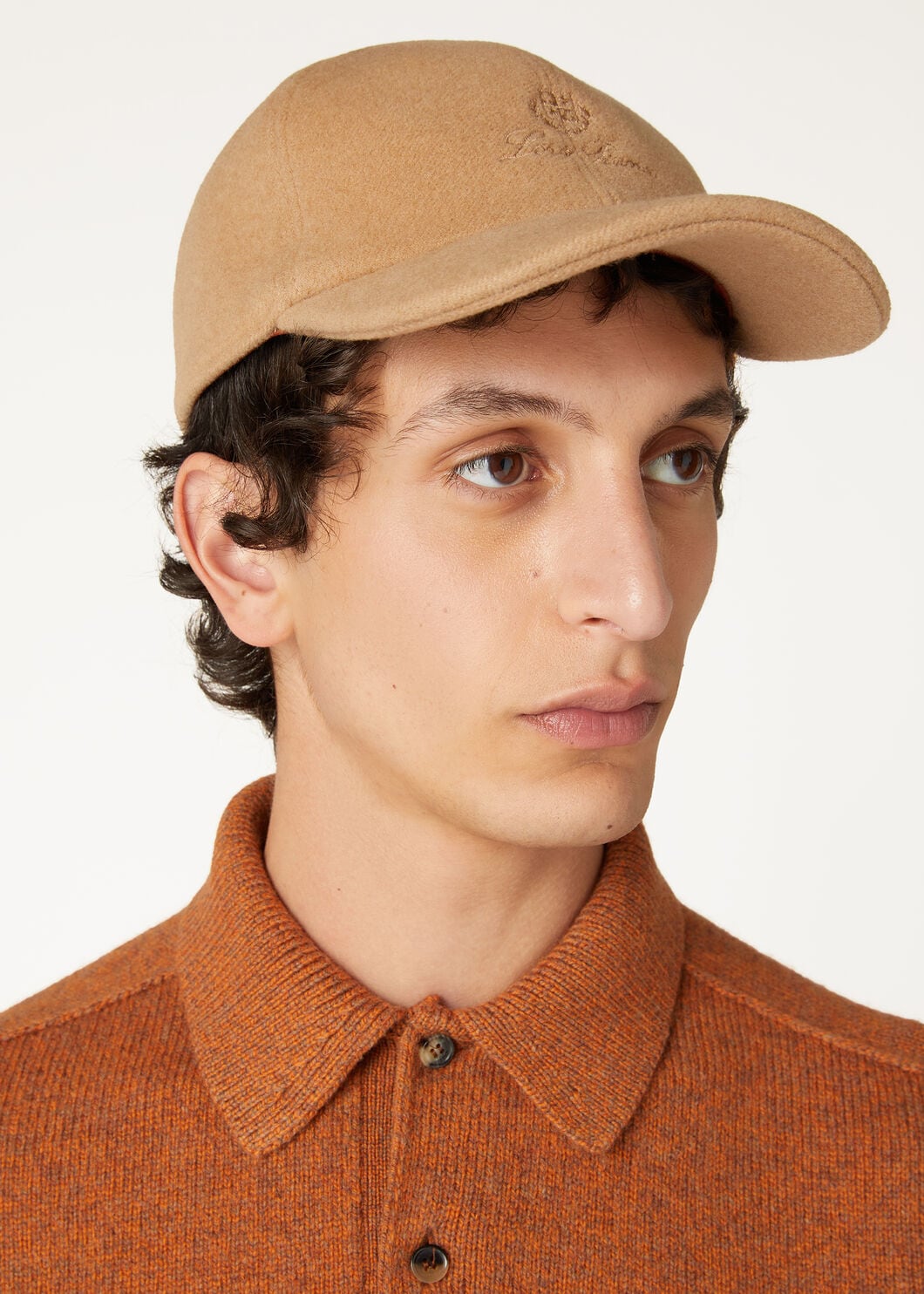 Baseball cap top button online