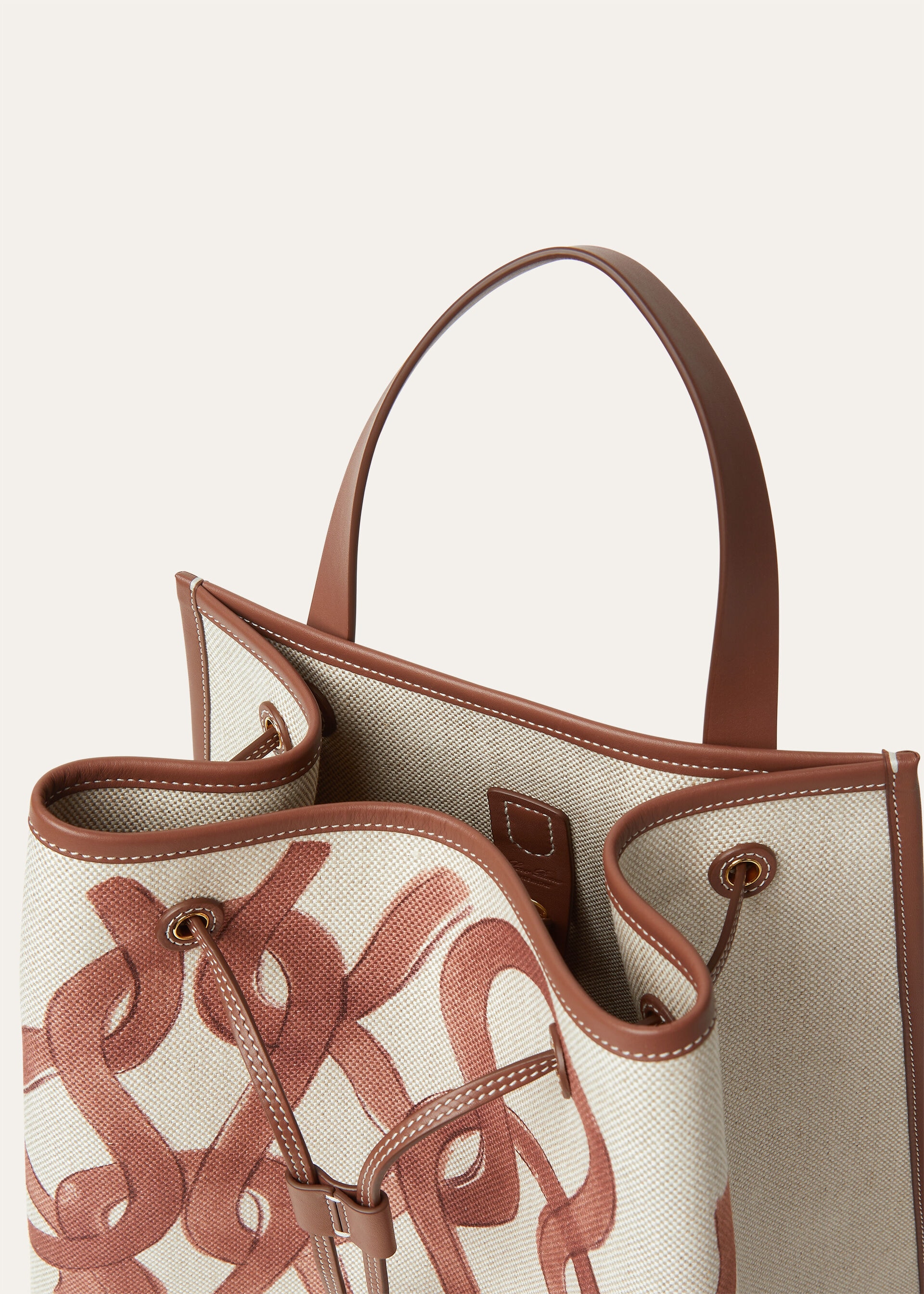 LAGUNA BACKPACK MD PTO RAS PRINT ON CNVS/RNDD LTH